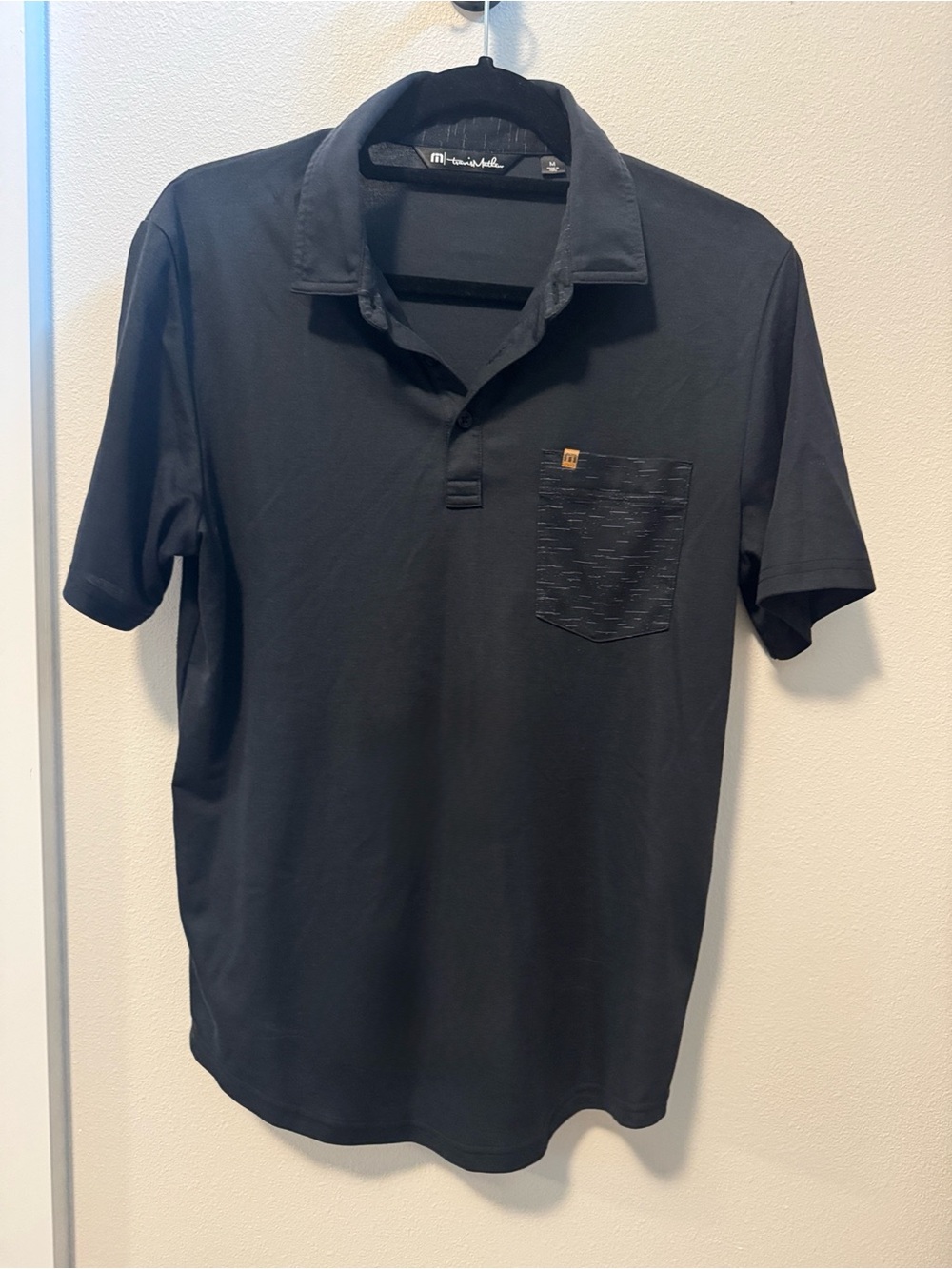 NWOT - Travis Mathew Black Polo with Patterned Chest Pocket